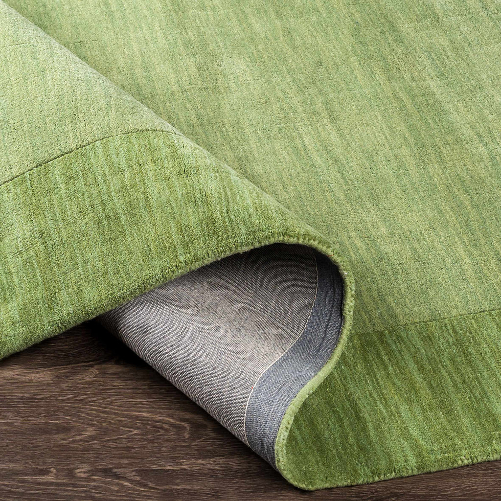 Bordered Solid Green Wool Rug