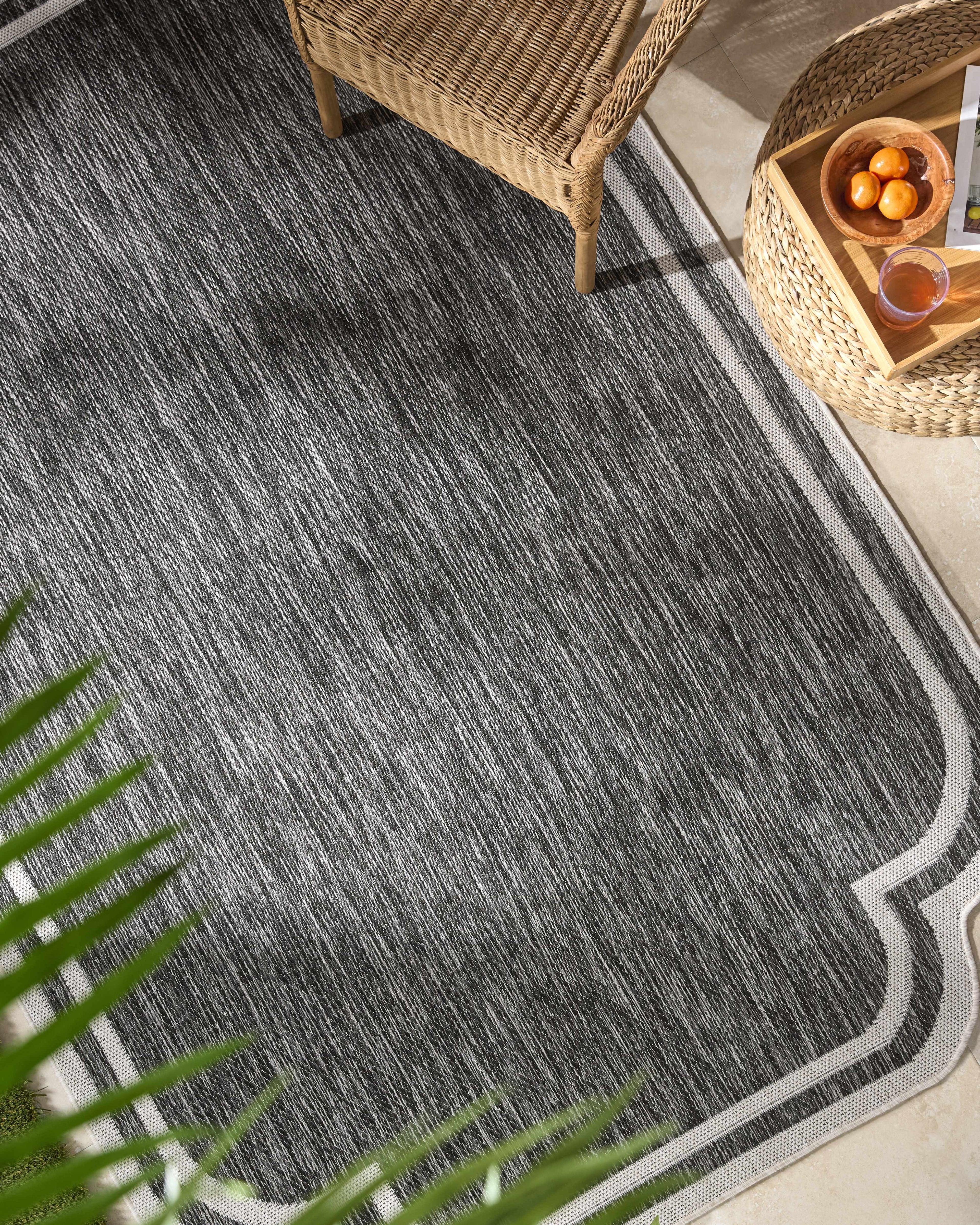 Arnola Black Outdoor Rug