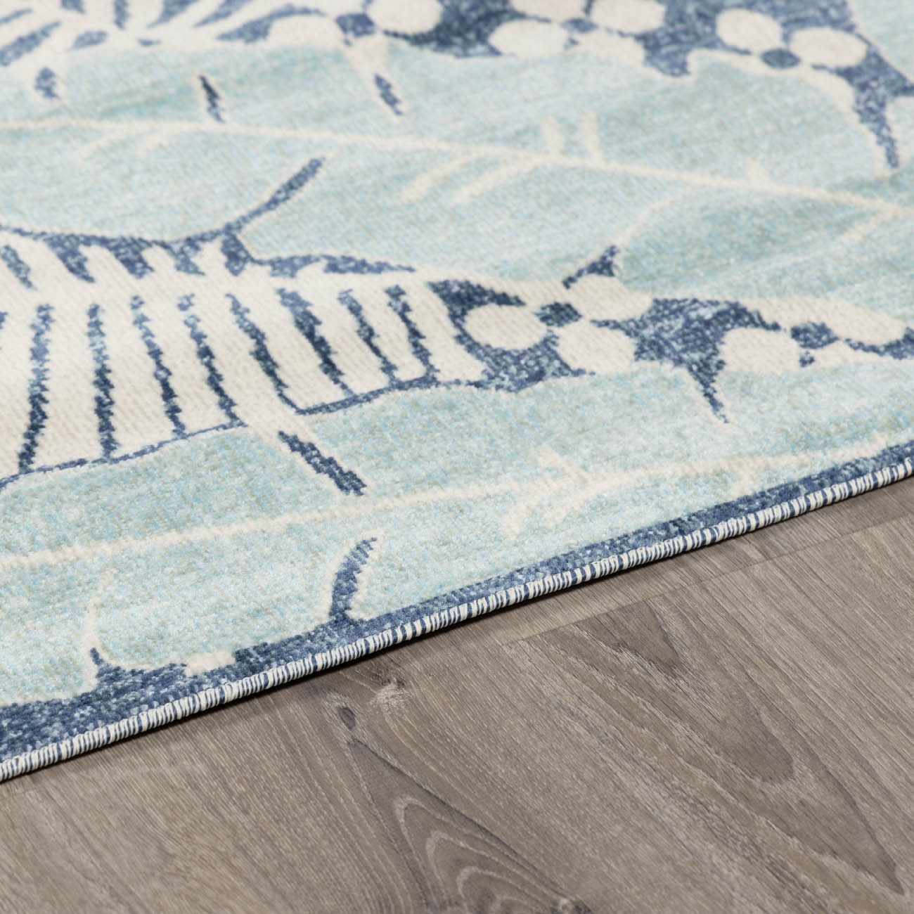 Thebarton Coastal Blue Palm Outdoor Area Rug