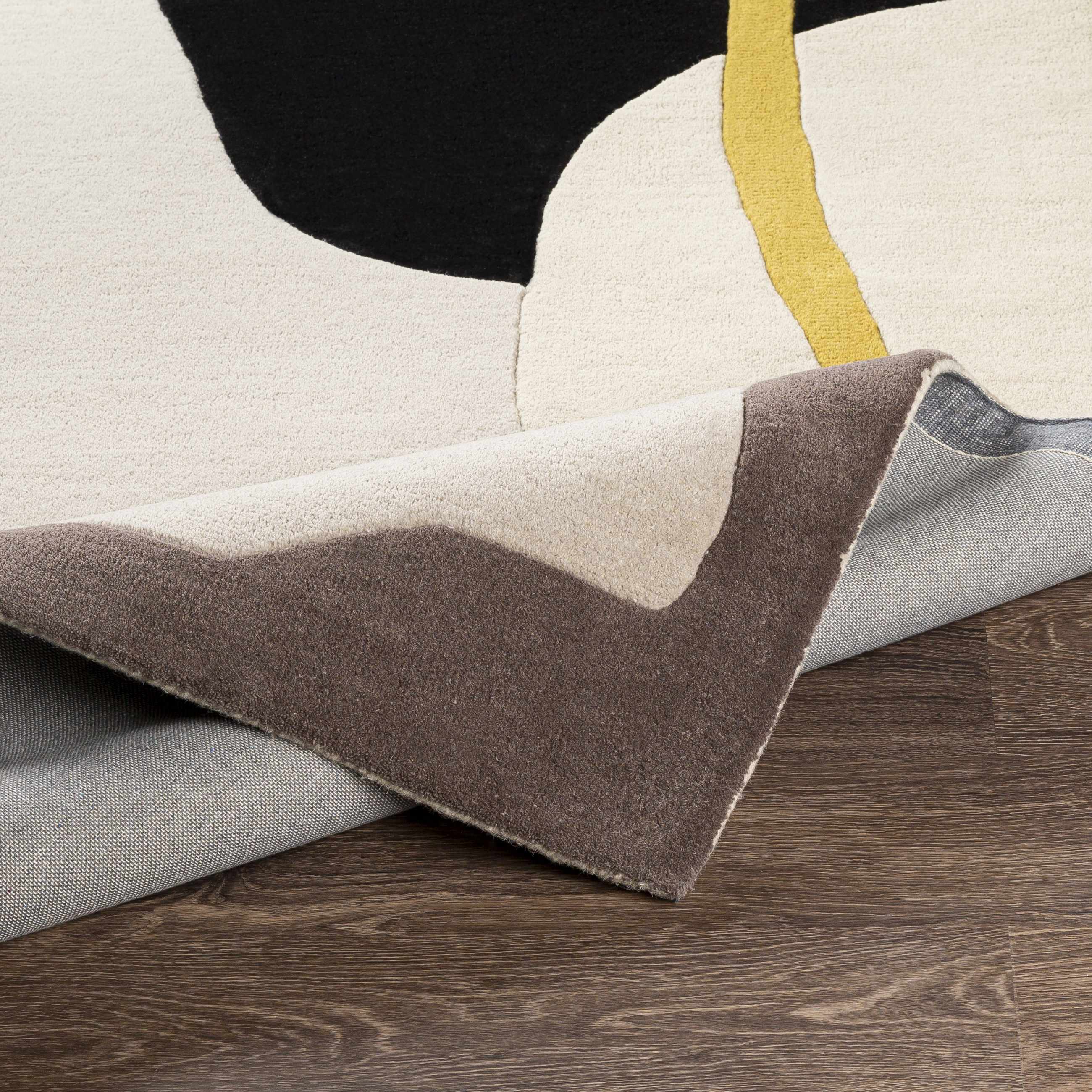 Elliminyt Area Rug